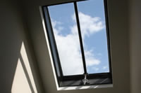 Internal view of Clement tile profile rooflight with chrome pole winder