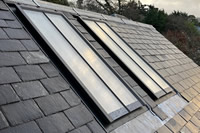 A pair of Clement Conservation Rooflights look absolutely stunning in this Welsh slate roof.