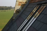 Linked slate profile rooflights in private house
